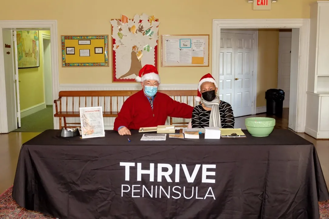 Volunteers at the THRIVE Peninsula gift card table