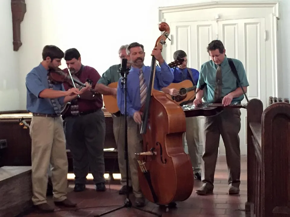 A bluegrass gospel group playing in the church